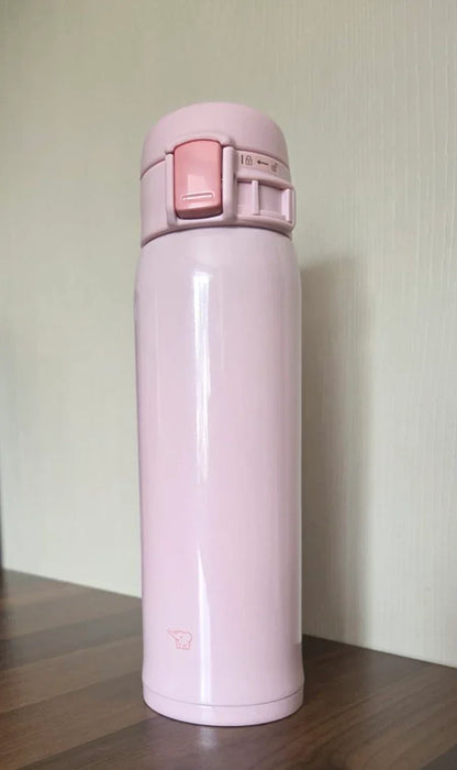Zojirushi Mug SM-SR60 Pink on the table